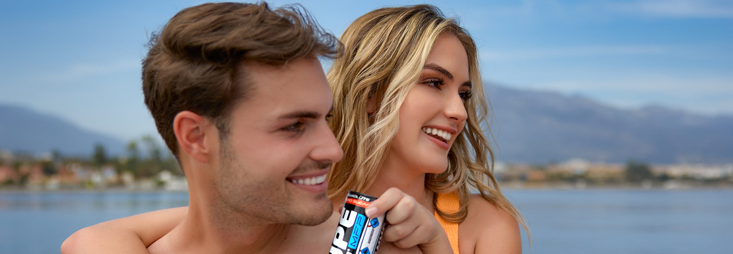 Young couple with hype energy drink.